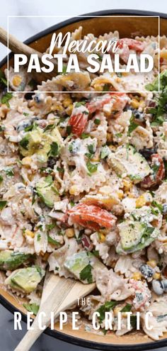 mexican pasta salad in a skillet with wooden spoons on the side and title overlay