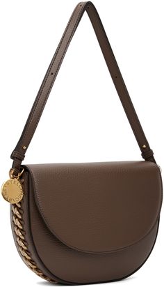 Grained faux-leather shoulder bag in brown. · Whipstitching and curb chain detailing throughout · Adjustable and detachable shoulder strap · Logo charm at side · Magnetic press-stud flap · Patch pocket at interior · Faux-suede lining · H7.25 x W9 x D2.5 Made from cruelty-free, non-animal materials. Supplier color: Brown Brown Workwear Bag With Chain Strap, Everyday Brown Flap Bag With Chain Strap, Stella Mccartney Frayme, Flap Shoulder Bag, Press Studs, Curb Chain, Stella Mccartney, Faux Suede, Patch Pocket