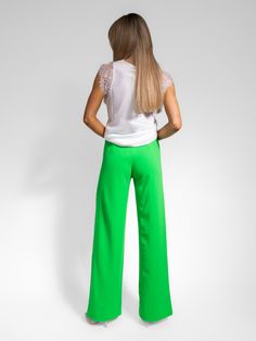 These trousers feature: Straight leg Wide leg fit High Waist Elasticated waist band Pull up - no zips or buttons High-waisted Elastane Wide Leg Pants For Summer, Summer Wide Leg Elastane Pants, Chic Green Bottoms With Elastic Waistband, Green High Waist Non-stretch Pants, Non-stretch High Waist Green Pants, Summer Stretch Trousers, Summer Straight Leg Elastane Bottoms, Stretch Summer Trousers, Green Stretch Wide Leg Pants