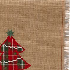 a christmas tree on burlap with red and green plaid