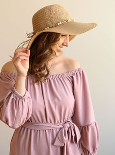 Block the rays in the most stylish of ways! Our BOHEMIAN hat comes in a natural tan woven texture. A straw beaded band tops off the look. Decorate your Summer outfits with a lightweight touch! Measurements: 4” Brim, 3.5” Crown Depth, 7.5” Head Diameter Material: 100% paper Chic Spring Boater Hat Made Of Paper Straw, Cream Straw Hat Bands For Vacation, Cream Straw Hat Band For Vacation, Cream Hat Bands For Summer Vacation, Cream Toquilla Straw Sun Hat For Spring, Adjustable Beige Straw Boater Hat, Spring Lightweight Panama Hat In Paper Straw, Spring Vacation Boater Hat In Paper Straw, Lightweight Paper Straw Hat For Spring