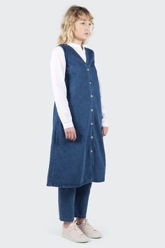 In extremely soft, mid weight denim made from 100% organic cotton, this Kowtow #denim #dress is exactly what your wardrobe needs. Wear it solo in the summer and layer a turtleneck underneath it during the winter. Dress With Pants Underneath, Dress With Pants, Sleeves Dress, Tres Chic, Denim Outfit, Upcycle Clothes, Denim Dress, A Line, Dresses With Sleeves