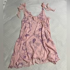 Nwot. Free People Intimately. Light Pink. Floral. Bow Ruffle Mesh Ties. Mini Slip Dress. Size Small. Please Refer To Photos For Condition And Details. Excellent Condition. The Color Is Close To What You See In My Photos. It’s A Very Pretty And Romantic Light Pink With Purple Floral Print. Due To Lighting And Angles The Color May Vary Slightly. Approximate Measurements Are In Photos. **Please Refer To Free People Sizing Or Similar Clothing Measurements For Optimal Fit 1090* Summer V-neck Sleepwear With Ruffles, Summer V-neck Ruffled Sleepwear, Summer Ruffled V-neck Sleepwear, Beach Nightgown With Ruffles For Spring, Spring Beach Nightgown With Ruffles, Flirty V-neck Sleepwear For Spring, Flirty Sleeveless Summer Sleepwear, Feminine Beach Nightgown For Summer, Spring V-neck Sleepwear With Ruffles