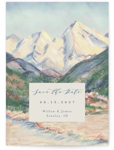 a wedding saver with mountains and watercolors in the background, on top of a