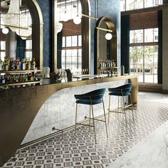 an elegant bar with gold and blue accents