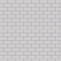 a white brick wall with grey lines on it