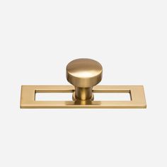 a brass door handle on a white background