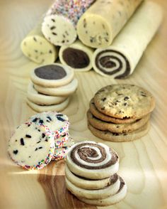 an assortment of cookies and pastries on a table