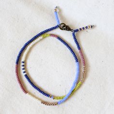 Wrap Bracelet (Multicolor Mix No. 3) – Ashdel Adjustable Multicolor Single Strand Beaded Bracelet, Adjustable Multi-strand Beaded Bracelets For Everyday, Adjustable Single Strand Heishi Beads Jewelry, Adjustable Single Strand Beaded Bracelets, Adjustable Single Strand Beaded Bracelet, Blue Beaded Minimalist Friendship Bracelets, Adjustable Colorful Beads Wrap Bracelet For Everyday, Adjustable Multi-strand Friendship Bracelets With Tiny Beads, Minimalist Adjustable Jewelry With Colorful Beads