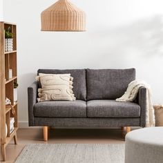 a living room filled with furniture and decor