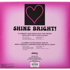 the back cover of shine bright, with pink lettering and a black heart on it