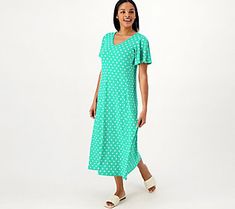 The pretty style of the midi dress plus the comfiness of Liquid Knit®? That's what we like to call a home run of a combination. From Susan Graver. Casual Knit V-neck Midi Dress, Casual V-neck Knit Midi Dress, Casual Knit Midi Dress With V-neck, Casual Stretch Midi Dress For Loungewear, Spring Knit Midi Dress For Loungewear, Knee-length Knit Loungewear Dresses, Knee-length Knit Dress For Loungewear, Knit Knee-length Lounge Dress, Green Knit Midi Dress For Spring