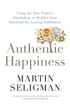 the book cover for authentic happiness by martin seliman, featuring an image of a tree