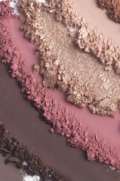 an aerial view of some pink, brown and green colored powdered eyeshades