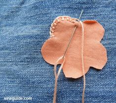 a piece of fabric with a flower on it