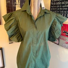 This Is Currently Still On The Website. $275 Retail. This Is Nwt - Gorgeous In Person. Size 12. Smoke Free Pet Friendly Home. Fall Short Sleeve Shirt With Ruffles, Fall Shirt With Ruffles And Short Sleeves, Fall Ruffled Short Sleeve Shirt, Green Ruffled Top For Office, Spring Green Ruffled Shirt, Green Cotton Ruffle Sleeve Blouse, Green Cotton Blouse With Ruffle Sleeves, Collared Ruffle Tops For Office, Button-up Ruffled Tops For Brunch