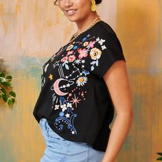 Curvy Gal Floral Bat-Wing Tee - 60% Cotton With Poly-Spandex Blend Size Shoulder Bust Sleeve Length Cuff 1xl 28.3 48.2 9.3 25.6 16.9 2xl 29.5 50.6 9.7 26 17.6 3xl 30.7 53 10.2 26.4 18.3 4xl 31.9 55.3 10.7 26.8 19.1 Your Purchase Helps Empower Marginalized Women Bind2 Chic Multicolor Top With Floral Embroidery, Chic Multicolor Tops With Floral Embroidery, Chic Multicolor Floral Embroidered Tops, Trendy Black Tops With Floral Embroidery, Trendy Floral Embroidered Short Sleeve Tops, Trendy Short Sleeve Tops With Floral Embroidery, Spring Stretch Tops With Floral Embroidery, Drop Shoulder Tee, Bat Wing