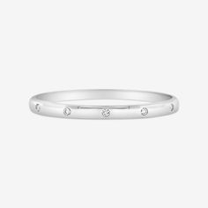 The Classic High Polished 5mm Bangle with special Burnished 5 Diamond Inlay details. An Iconic staple. Ready for you to Stack or wear Solo. Natural Diamonds: 0.40ctw 14K Yellow or White Gold Width: 5mm Size: 46 x 56 (Small - Medium) Hidden Clasp Classic Diamond Stackable Jewelry, Classic White Gold Diamond Ring, Classic White Gold Bangle With Single Diamond, Timeless Stackable Diamond Bracelet For Everyday Luxury, Classic Silver Eternity Band For Everyday, Classic Stackable Diamond White Jewelry, Timeless Stackable Diamond Bracelet, Everyday Stackable Rings In White Gold With Diamond Accents, Everyday Stackable White Gold Rings With Diamond Accents