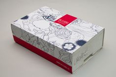 an open box with drawings on it sitting on a table