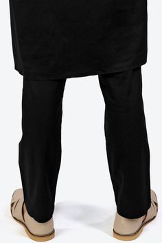 The Jade Black Men's Kurta Set exudes elegance and comfort. Crafted from premium cotton, it offers a luxurious feel. The subtle sheen adds a touch of sophistication, making it perfect for special occasions. This set makes a versatile and stylish choice for men's ethnic attire. Kurta Fused collar and cuffs, collar stand and flat felled side seams provide structure and stability to all our shirts. Fabric:100% Premium Cotton. Solid Weave. Limited quantity, Seasonal collection. We change our fashion Black Pajamas, Collar And Cuff, First World, Cotton Shirt, Black Men, Jade, Pajamas, Sleeve Length, Black