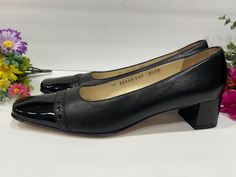 Vintage women's shoes pumps Salvatore Ferragamo Boutique, black leather patent cap toe pump heels.  Pre- owned condition with minor wear on body of the shoe. dimensions :-  taken on outside 11" x 3 3/4" Formal Spring Cap Toe Heels, Spring Formal Cap Toe Heels, Black Cap Toe Heels, Black Cap Toe Heels For Spring, Vintage Women's Shoes, Pump Heels, Womens Pumps, Shoes Pumps, Salvatore Ferragamo