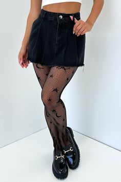 Take any fit to the next level with the Zoe Stockings! These babes feature a star fishnet design, an elasticised waistband and a full length fit! Pair them with knee high boots, a black mini skirt and your fave corset! Edgy Black Fishnet Bottoms, Black Fishnet Edgy Bottoms, Trendy Black Legwear For Night Out, Black Fishnet Bottoms For Night Out, Edgy Fitted Hosiery For Night Out, Black Star Print Bottoms For Night Out, Fitted Mesh Mini Length Bottoms, Edgy Black Legwear For Night Out, Stretch Halloween Mini Skirt