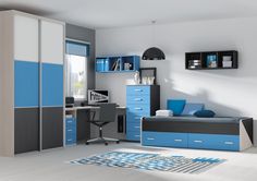 a bedroom with blue and gray furniture in the room, including a bed, desk, chair, bookshelf and bookcases