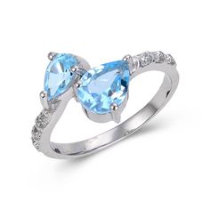 Sterling Silver Pear Shape Blue Topaz Ring with White Topaz.
$ 50 & Under, 6, 7, 8, Blue, Pear, Blue Topaz, White Topaz, 925 Sterling Silver, Fashion Silver Halo Ring, Purple Sapphire Ring, Blue Gemstone Ring, Blue Gemstone Rings, White Sapphire Ring, Blue Stone Ring, Matching Ring, Purple Sapphire, Red Gemstones