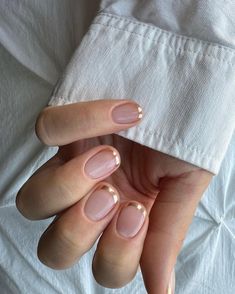 From subtle short nail styles to dazzling shimmers, these winter French tip nails, promise equal parts luxury and seasonal for your January manicure, particularly if you want your January nails to be a stark contrast to your December manicure, or if you're looking for very last minute NYE party nail art.