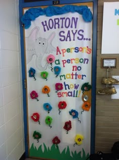 an image of a classroom door decorated with flowers and the words horton says on it