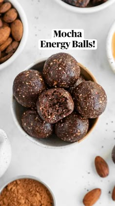 nuts and chocolate in small bowls on a table