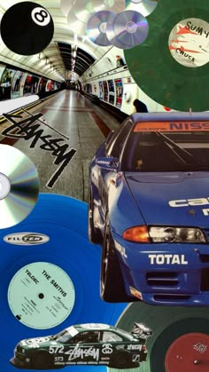 various cd's and cds are shown in this collage, including a blue sports car