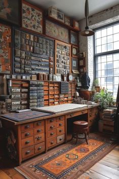 an old fashioned desk with lots of books on the shelves and drawers in front of it