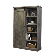 an open bookcase with books and baskets on the bottom shelf, against a white background