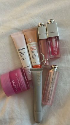 Lip balms, laneige, rhode, Dior  lip products Dior Lip, Makeup Bag Essentials, Lip Products, Makeup Brands