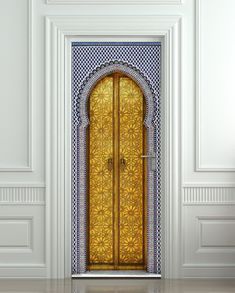 an open door in a white room with blue and gold designs on the front doors