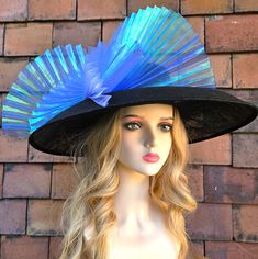 Royal Ascot Hat Blue Black Large Derby Hat Ladies Wide Brim Wedding Hat Church Hat Wedding Guest Hat - Kentucky Derby Hat Occasion Hat Ladies Day Formal Racing Event Mother of the Bride Cocktail Hat This elegant hat is perfect for a formal occasion and it can be your Royal Ascot Hat, Derby Hat, Wedding Hat  or a Church Hat. With its sophisticated design and classy cocktail hat style, it's sure to be a perfect headpiece for any Mother of the Bride or a Ladies day hat event. Size: Diameter 48 cm. Blue Costume Hats And Headpieces For Church, Blue Brimmed Mini Hats For Party, Blue Top Hat With Curved Brim For Formal Occasions, Blue Brimmed Fascinator For Wedding, Blue Brimmed Hats For Evening, Blue Curved Brim Top Hat For Formal Occasions, Blue Brimmed Evening Hats, Formal Blue Wide Brim Top Hat, Blue Wide Brim Top Hat For Formal Occasions