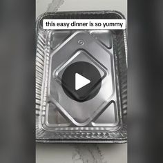 an image of a metal container with a video playing button on the lid that says, this easy dinner is so yummy