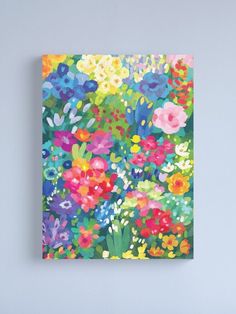 colorful flowers on a blue background canvas print