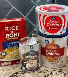 three containers of food are sitting on the counter