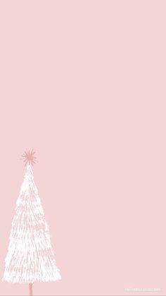 a white christmas tree on a pink background