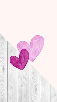 two hearts on a pink and white background