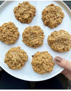 a white plate topped with cookies on top of a table