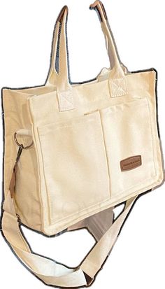 Cream Rectangular Canvas School Bag, Rectangular Cream Canvas School Bag, Cream Rectangular Canvas Bag For School, Cream Shoulder Bag With Pockets For School, Cream Bags With Pockets, Cream Canvas Shoulder Bag With Pockets, Beige Canvas Shopping Bag With Zipper Pocket, Crossbody Canvas Shopping Bag With Pockets, Cream Shopping Bag With Pockets