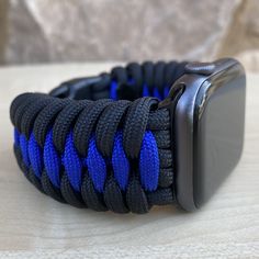 "FREE USPS PRIORITY MAIL SHIPPING FOR DOMESTIC US ORDERS (Includes U.S. Military APO/FPO Address Overseas) Thank you for visiting our shop \"Cording 2U\". A veteran owned business. Handcrafted Paracord wearables customized \"According To You\". Handcrafted with 100% Nylon Paracord \"MADE IN USA\" Our Products include: 🔹Custom handcrafted watch bands according to your wrist size, style, and color of choice. If you don't see it in our page yet, please contact us and we can discuss your options. ? Handmade Blue Watch Bands For Everyday Use, Handmade Adjustable Apple Watch Band, Durable Adjustable Blue Watch Bands, Customizable Adjustable Blue Watch Bands, Paracord Watch, Handmade Watch Bands, Apple Watch Sizes, Apple Watch Accessories, 550 Paracord