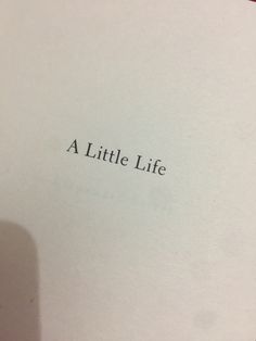 an open book with the words a little life written on it