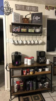 the coffee bar is stocked with many different types of cups and mugs on it