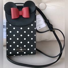 Nwt Kate Spade Disney Minnie Mouse Flap Phone Crossbody Polka Dots Black Multi Measurements: 4.2” (W) X 7.2” (H) X 1.5" (D) Magnetic Closure Adjustable Crossbody Strap Material: Pvc Interior: 3 Credit Card Slots Exterior: 2 Credit Card Slots Will Ship Fast!! We Only Sell Brand New And 100% Authentic Merchandise. Shop With Confidence Thank You For Looking & Happy Shopping Trendy Black Minnie Mouse Bag, Disney Kate Spade, Disney Adult, Kate Spade Disney, Merchandise Shop, Crossbody Strap, Magnetic Closure, Card Slots, Minnie Mouse