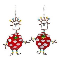 pair of red and white earrings with cartoon character on it's ear wires, hanging from hooks