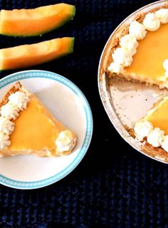 a piece of pie sitting on top of a white plate next to a slice of watermelon